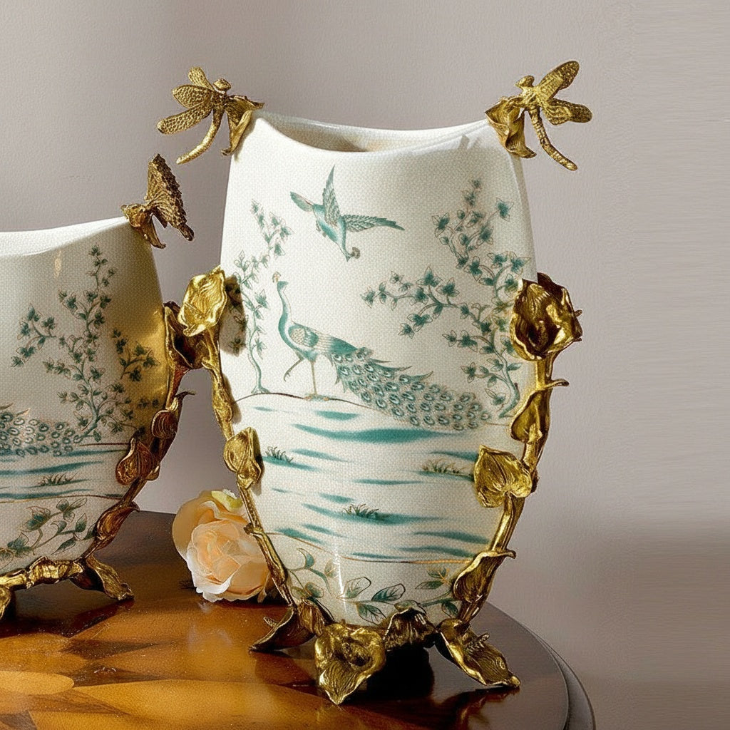 Front view of ceramic vase with brass dragonfly and peacock details