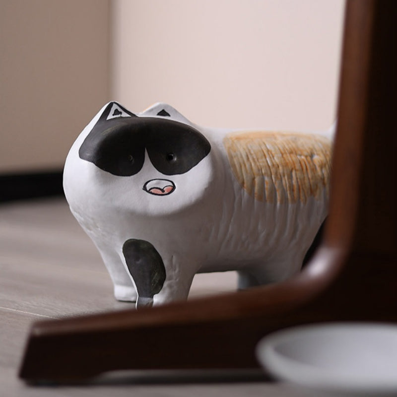 Low angle view of ceramic cat figurine