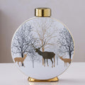 Large white ceramic disc vase with gold stag design