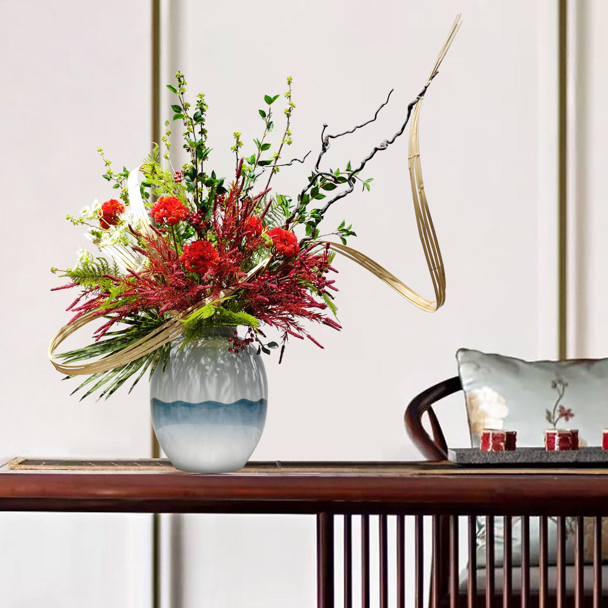 Lifestyle setting of Ikebana style arrangement on wooden table