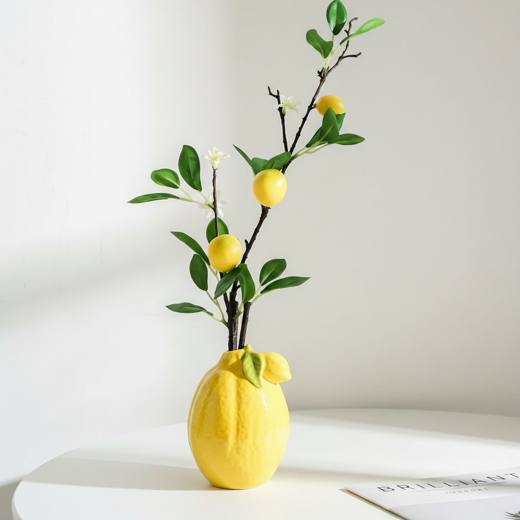 Ceramic lemon vase with floral arrangement