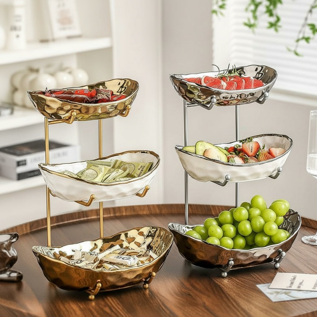 Gold 3-tier serving stand with fruit and snacks