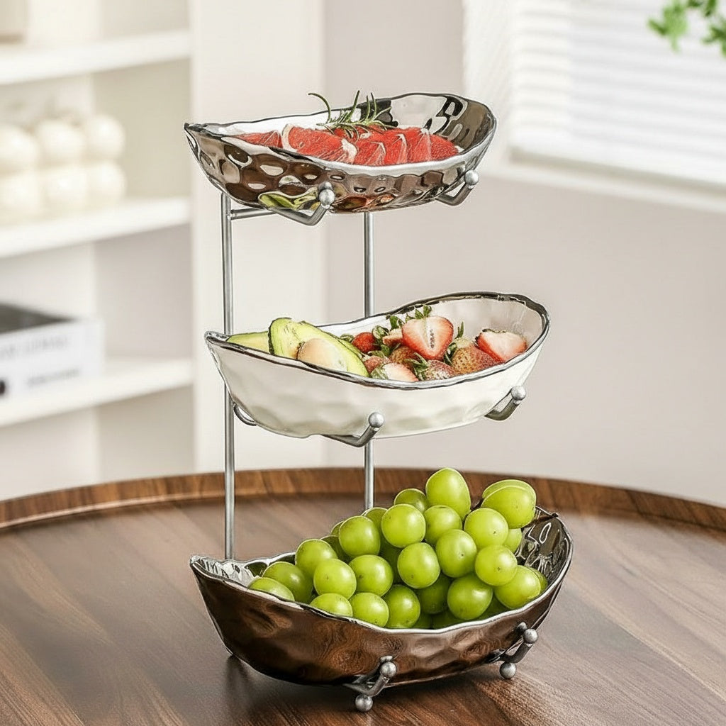 Silver 3-tier fruit stand filled with fresh produce