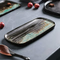 Overhead view of empty textured ceramic platter