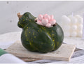 Green speckled ceramic pumpkin planter side view