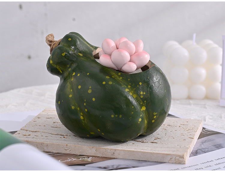 Green speckled ceramic pumpkin planter side view