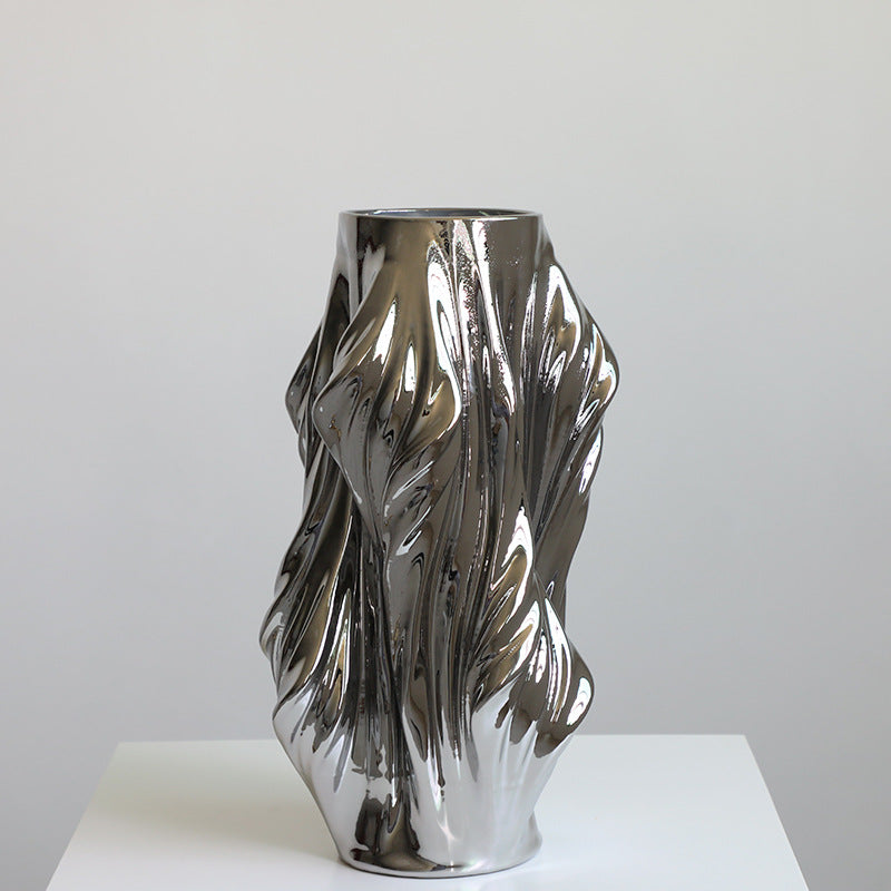 Large chrome silver ceramic twisted vase front view