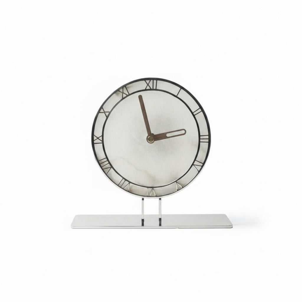 Front view of round table clock with roman numerals