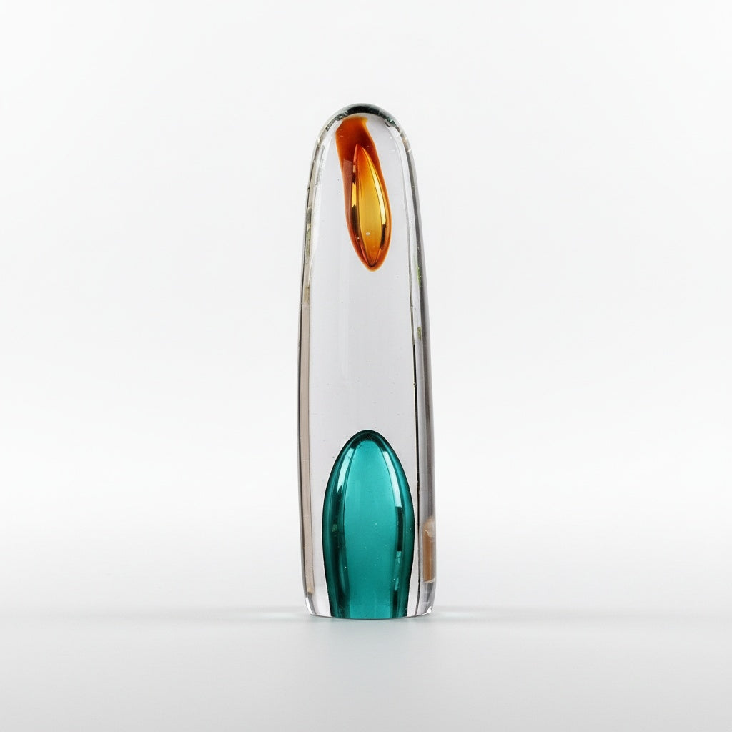 Front view of clear glass capsule sculpture with internal colored details