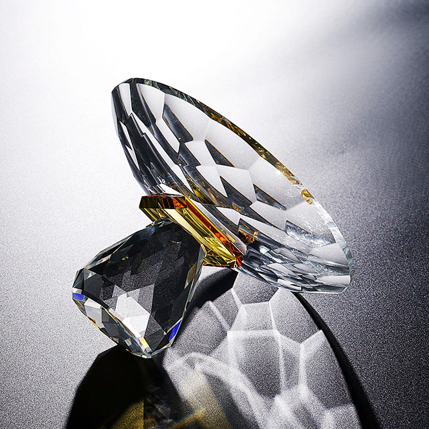 Underside view showing diamond cut facets of the base