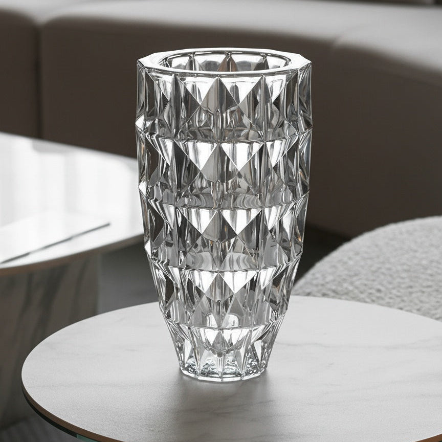 Clear crystal geometric vase on a modern living room table