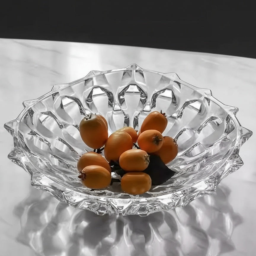 Clear faceted crystal fruit bowl styled with fresh oranges as a decorative glass centerpiece