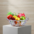 Clear crystal glass faceted fruit bowl filled with colorful fruit