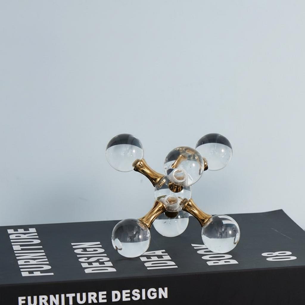 Close up of crystal spheres with bubbles and gold connectors