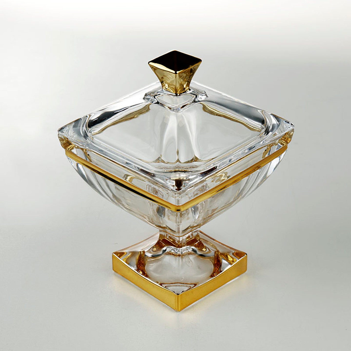 High angle view of the glass jar with gold finial