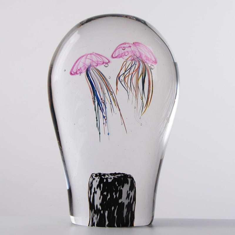 Front view of clear glass jellyfish sculpture