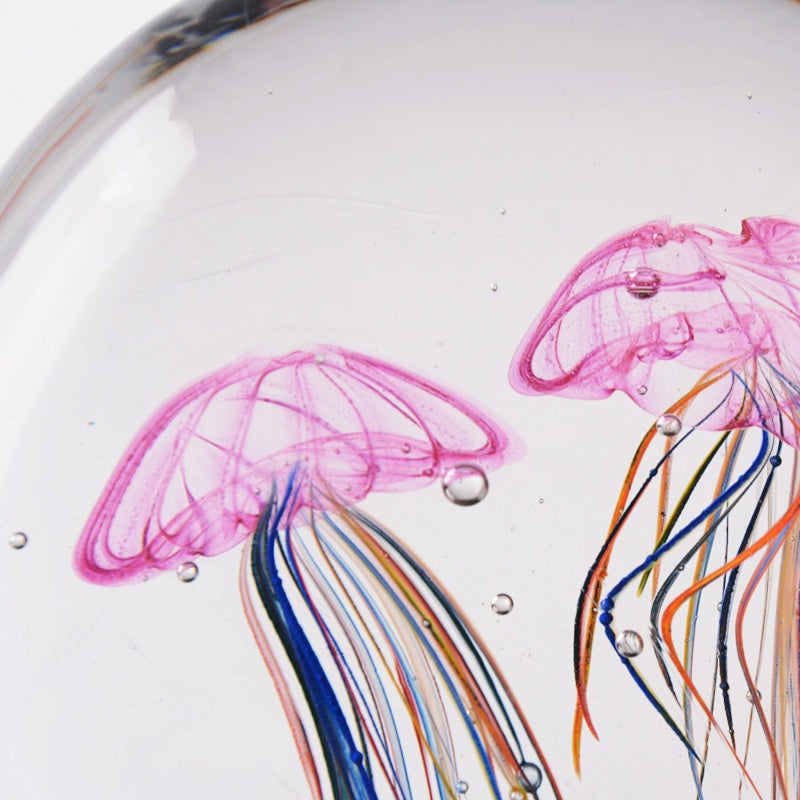 Close up of pink jellyfish bells in art glass