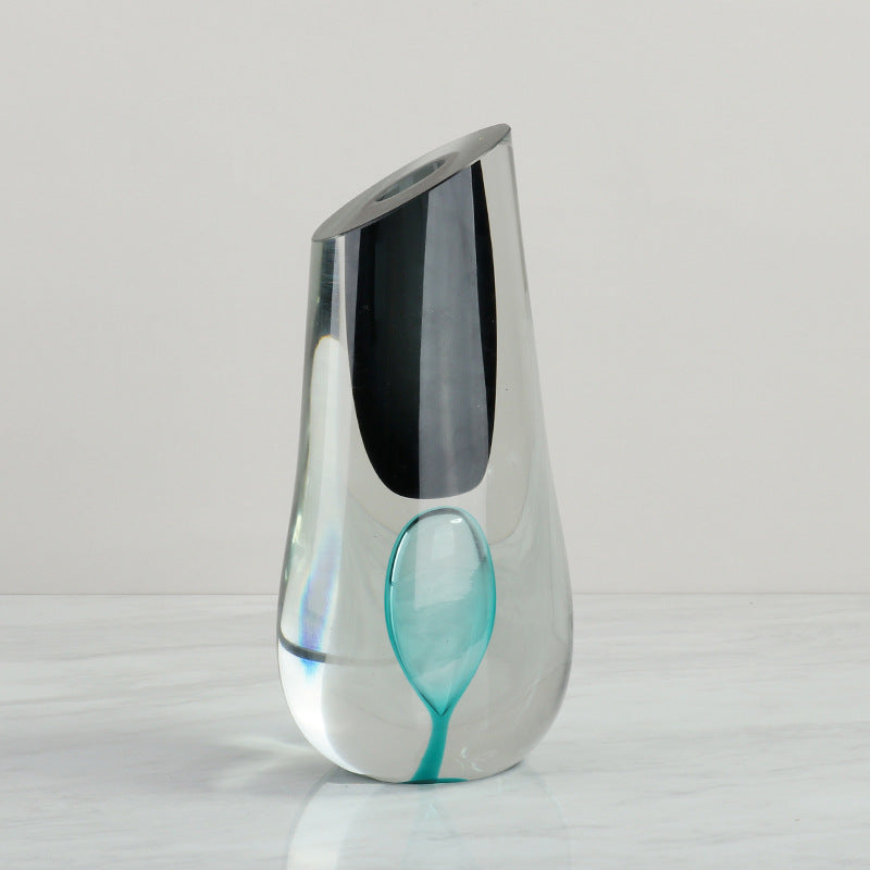 Front view of clear glass vase with black and teal accents