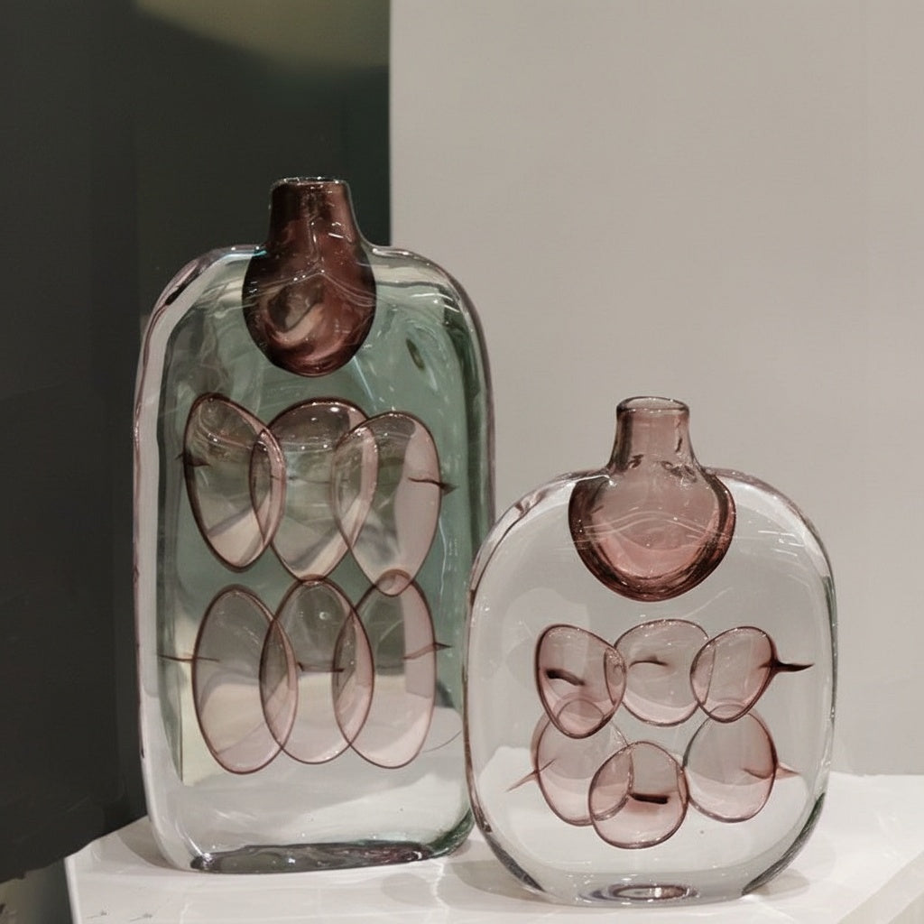 Group shot of large and medium art glass vases with mauve details