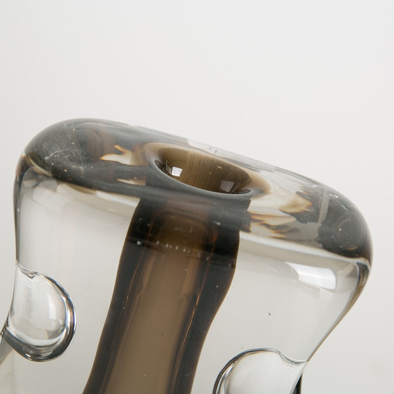 Top rim detail of clear and smoked glass vase