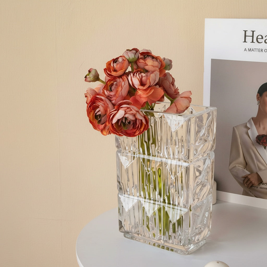 Front view of clear textured crystal vase with flowers