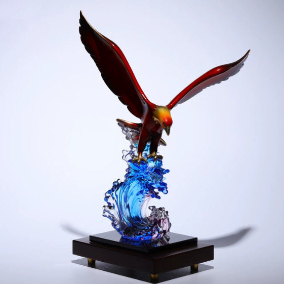 Front angle view of copper eagle statue landing on wave