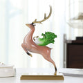 Front angle view of copper deer figurine