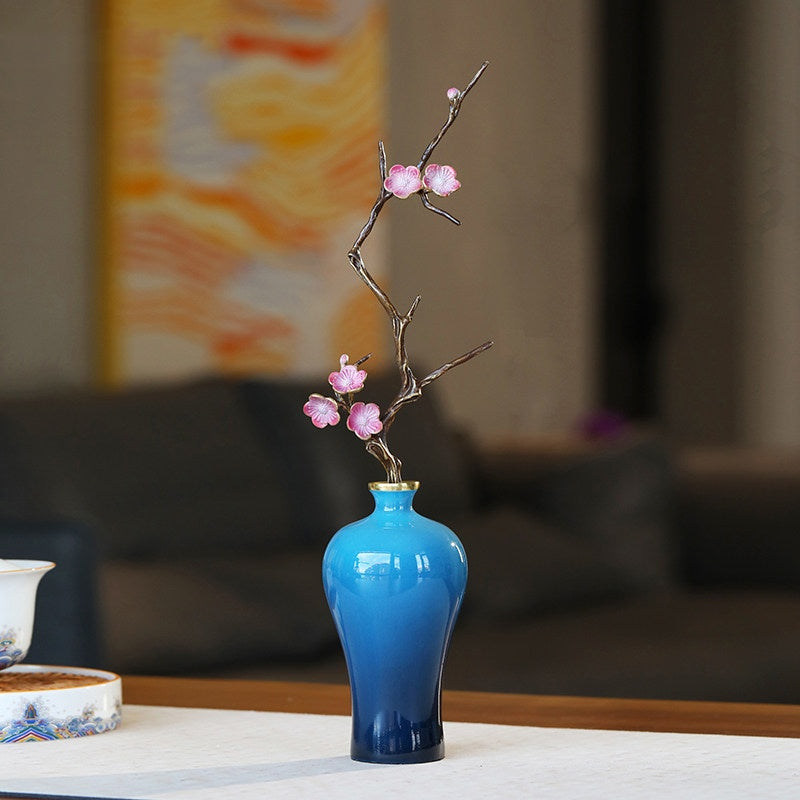 Lifestyle view of floral sculpture on table in elegant living room setting