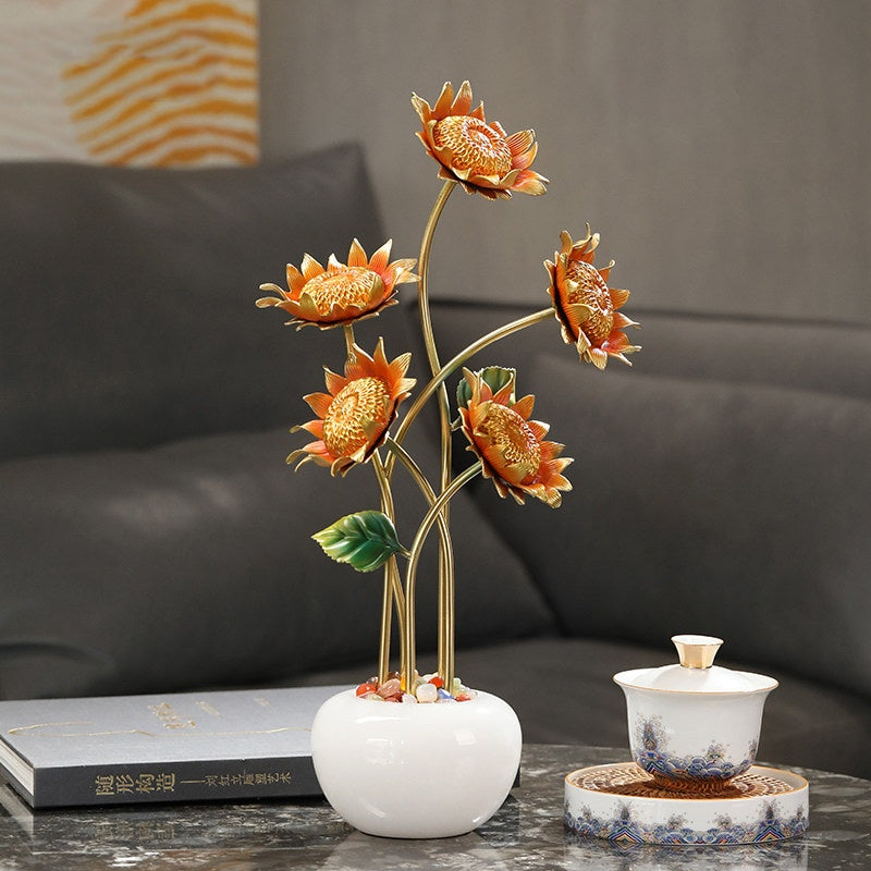 Full view of floral metal sculpture on marble table