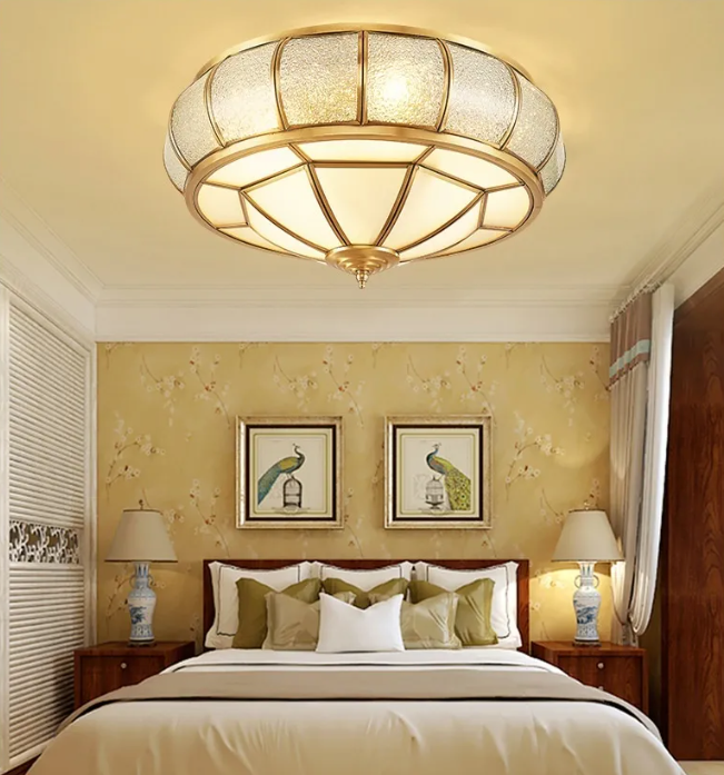 Front view of the copper and glass flush mount fixture