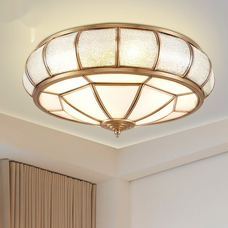 Angled view of the illuminated copper ceiling fixture