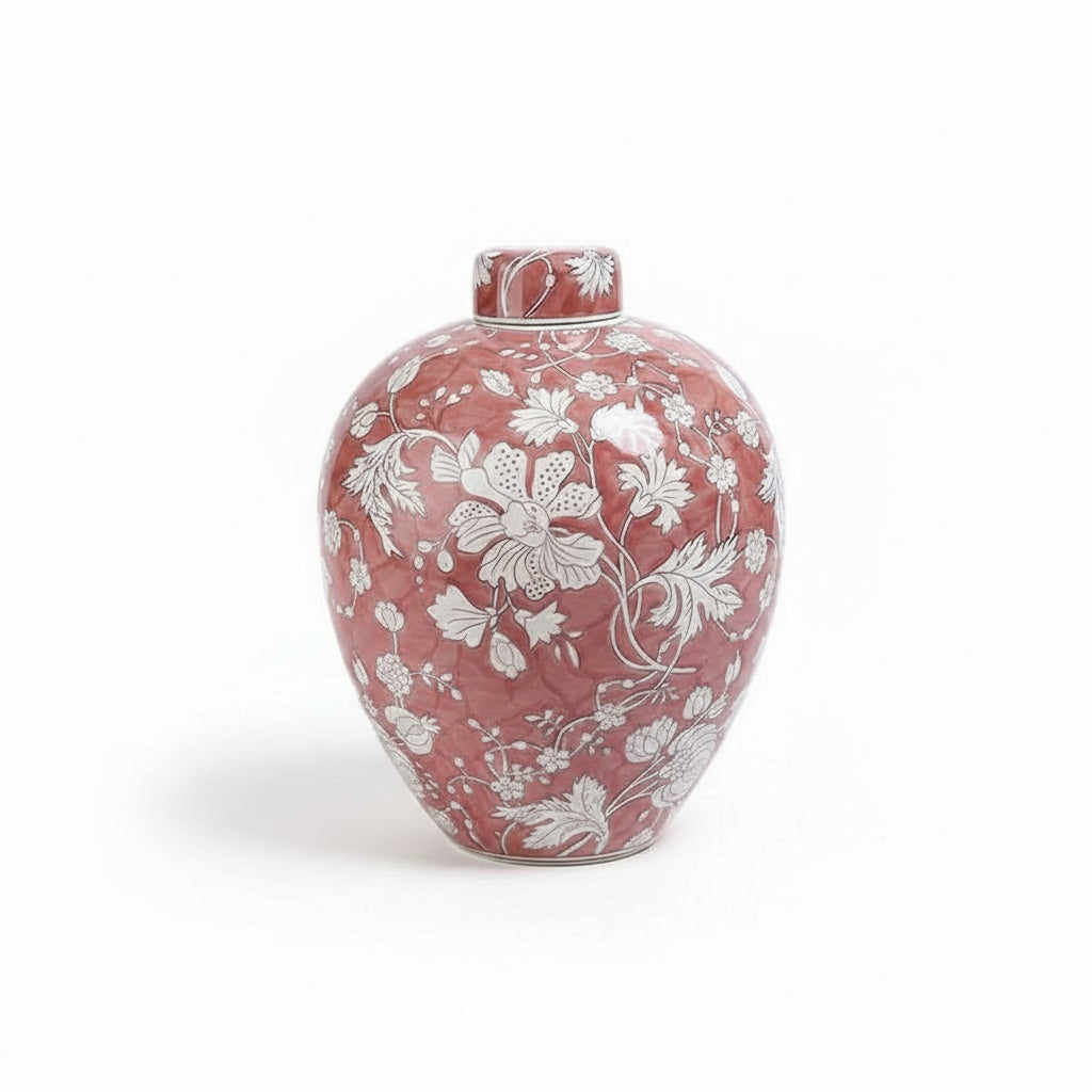 Front view of coral floral ceramic ginger jar with lid