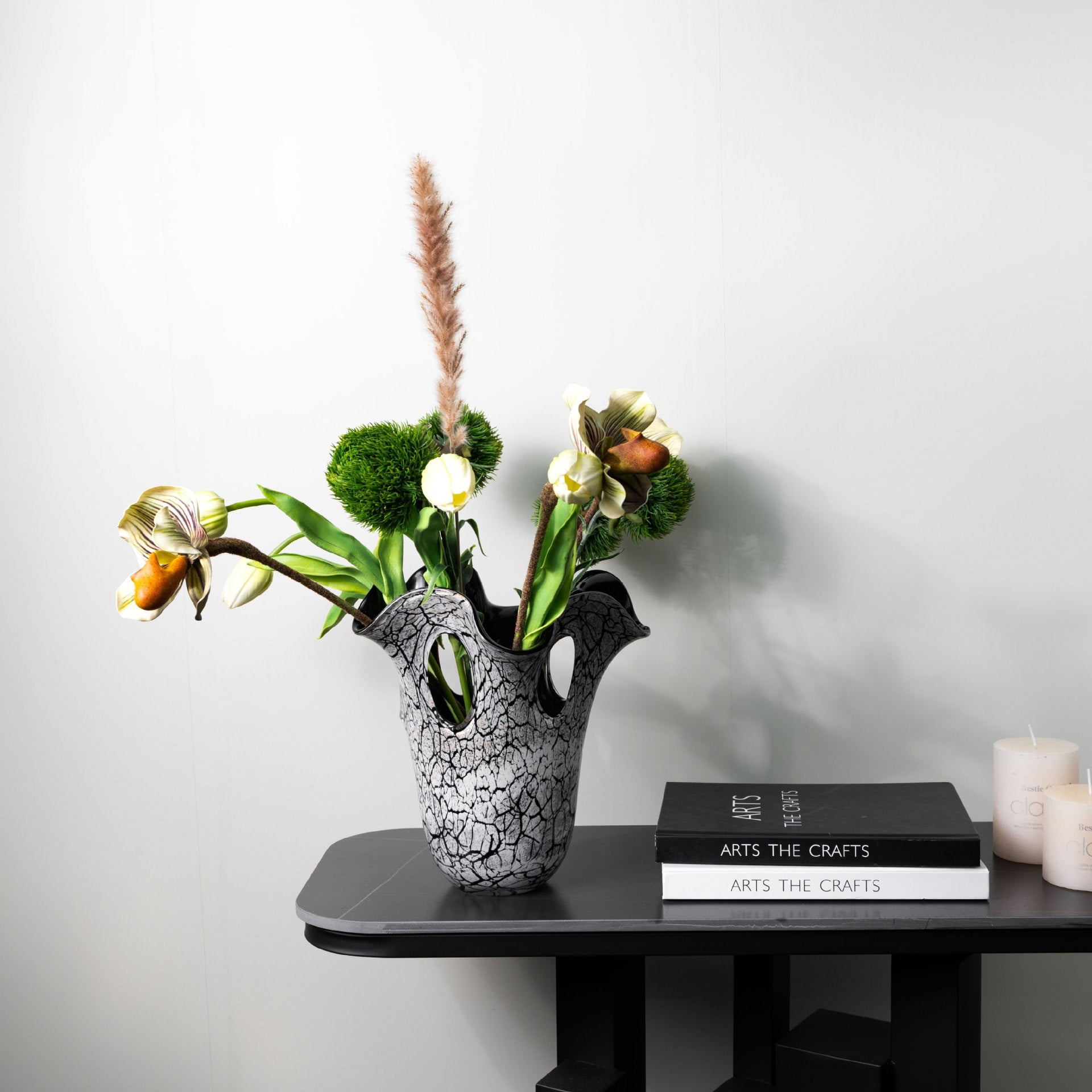 Medium grey crackle glass vase with green floral arrangement