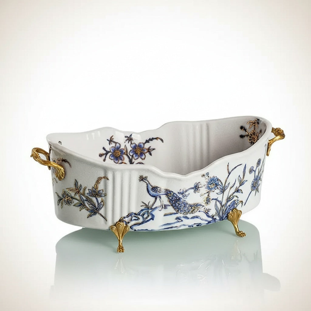 Front view of empty porcelain bowl with brass feet