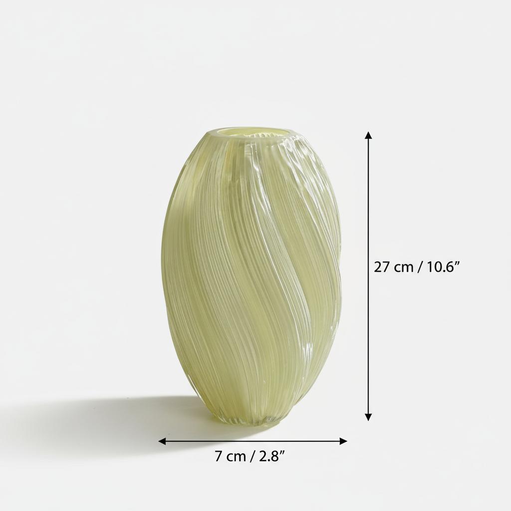 Cream glass vase styled with pink roses