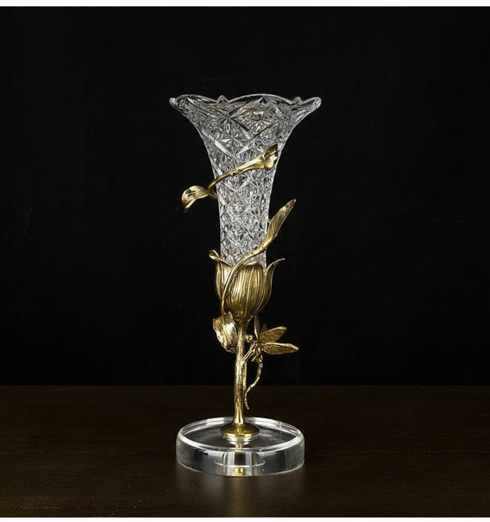 Full view of illuminated crystal vase against dark background