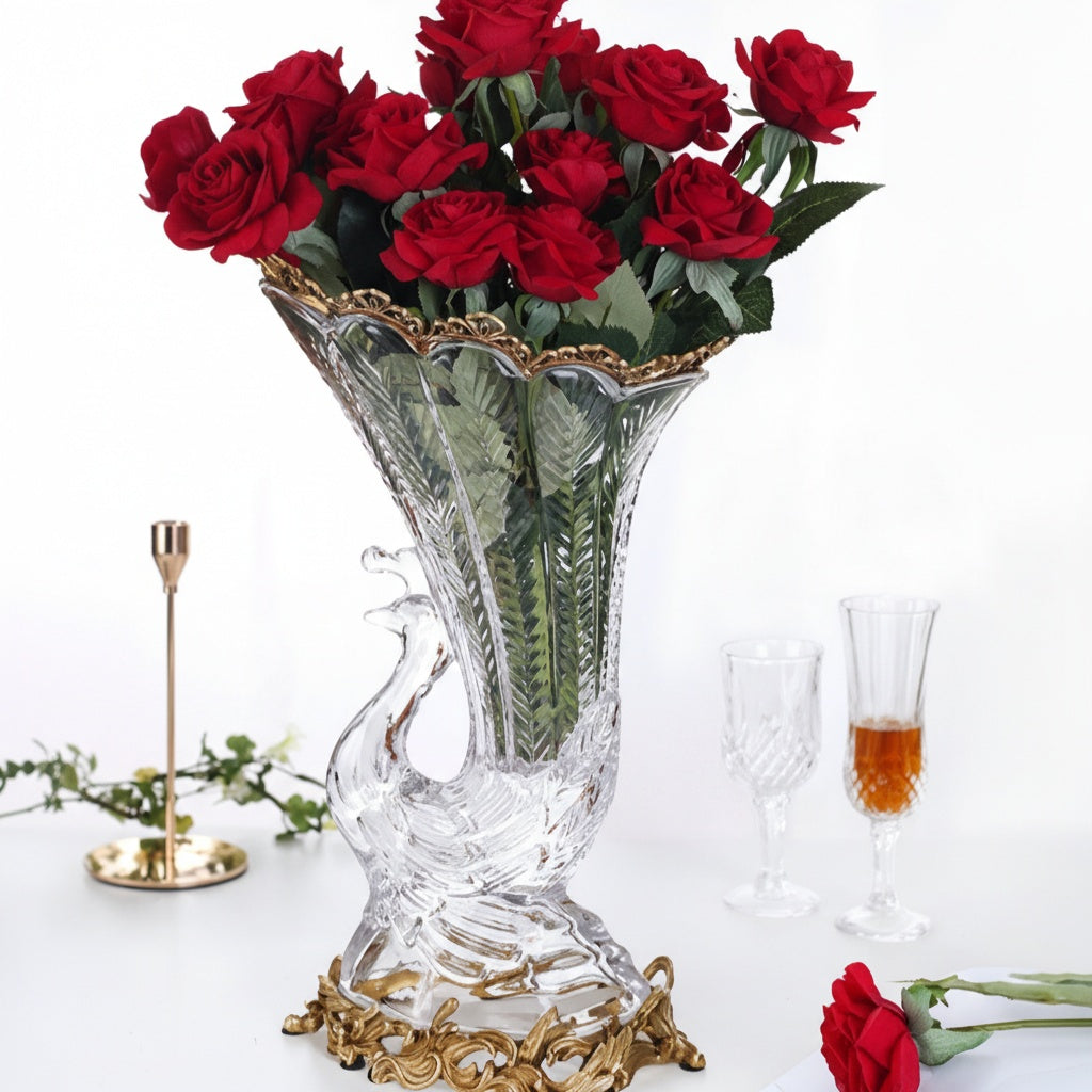 Angled view of crystal cornucopia vase with red roses