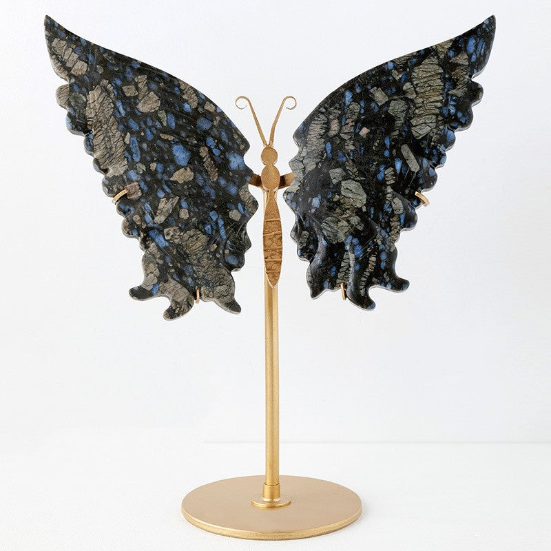 Dark blue and black stone butterfly sculpture on gold stand