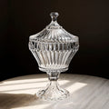 Crystal glass fluted lidded jar on table