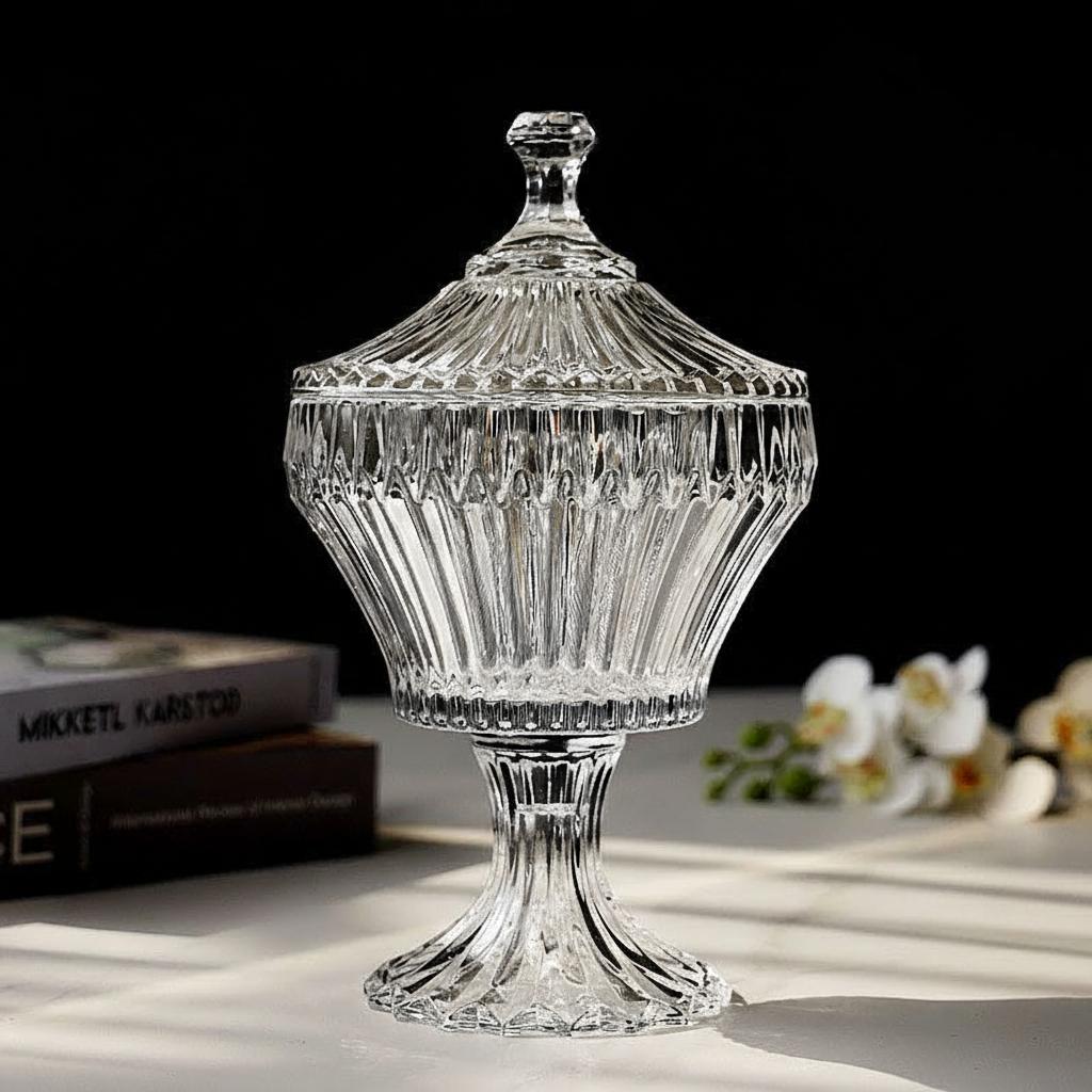 Crystal glass fluted lidded jar styled with books