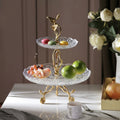 Lifestyle view of 2-tier stand serving fruits and macarons