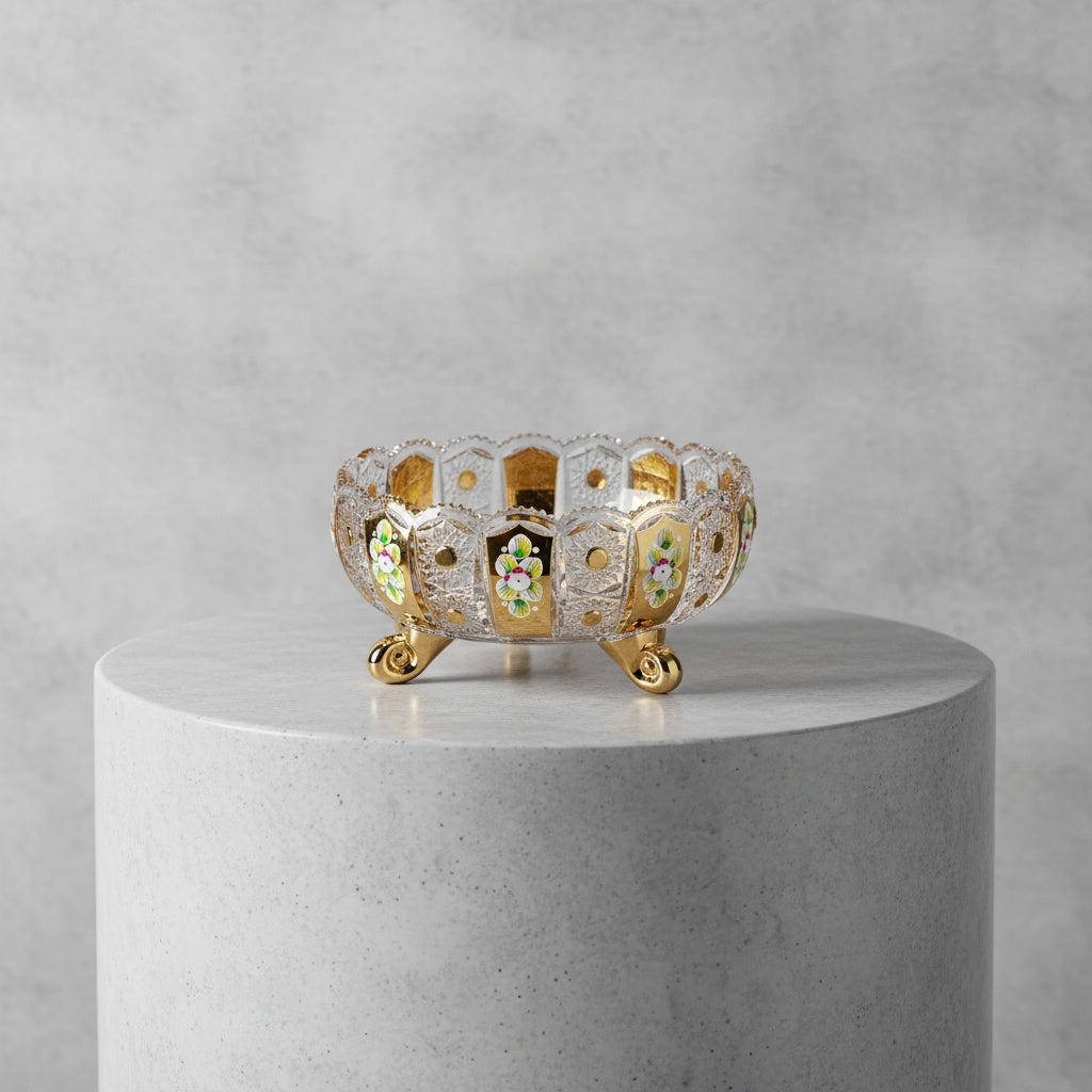 Close up of medium crystal tripod bowl with gold plating and flowers