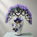 Angled view of purple crystal floral sculpture