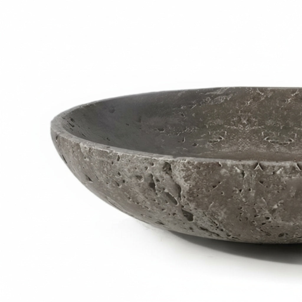 Close up of dark travertine bowl texture