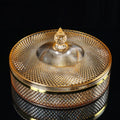 Angled view of amber glass lidded candy bowl