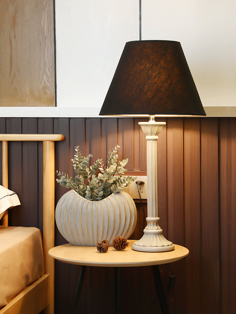 Luxury ribbed ceramic vase styled with lamp