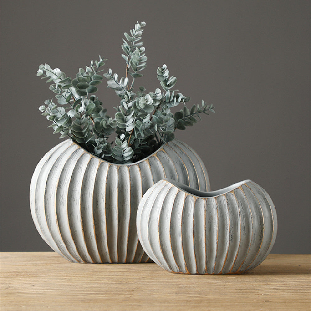 Set of two distressed grey ceramic vases with gold detailing