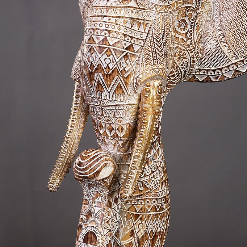 Side angle detail of intricate resin carvings