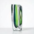 Side angle of heavy crystal vase showing green core