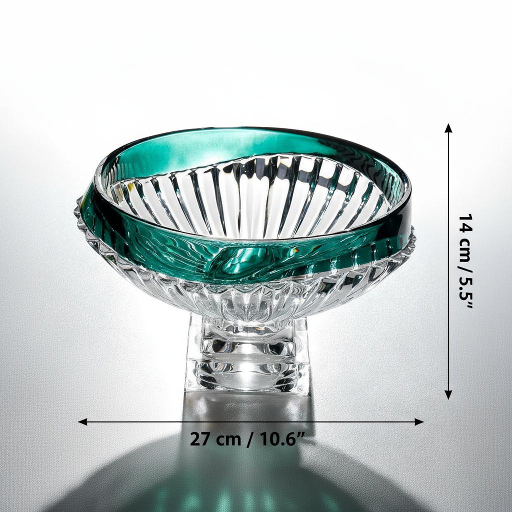 Emerald green glass pedestal bowl displayed on table with lifestyle decor